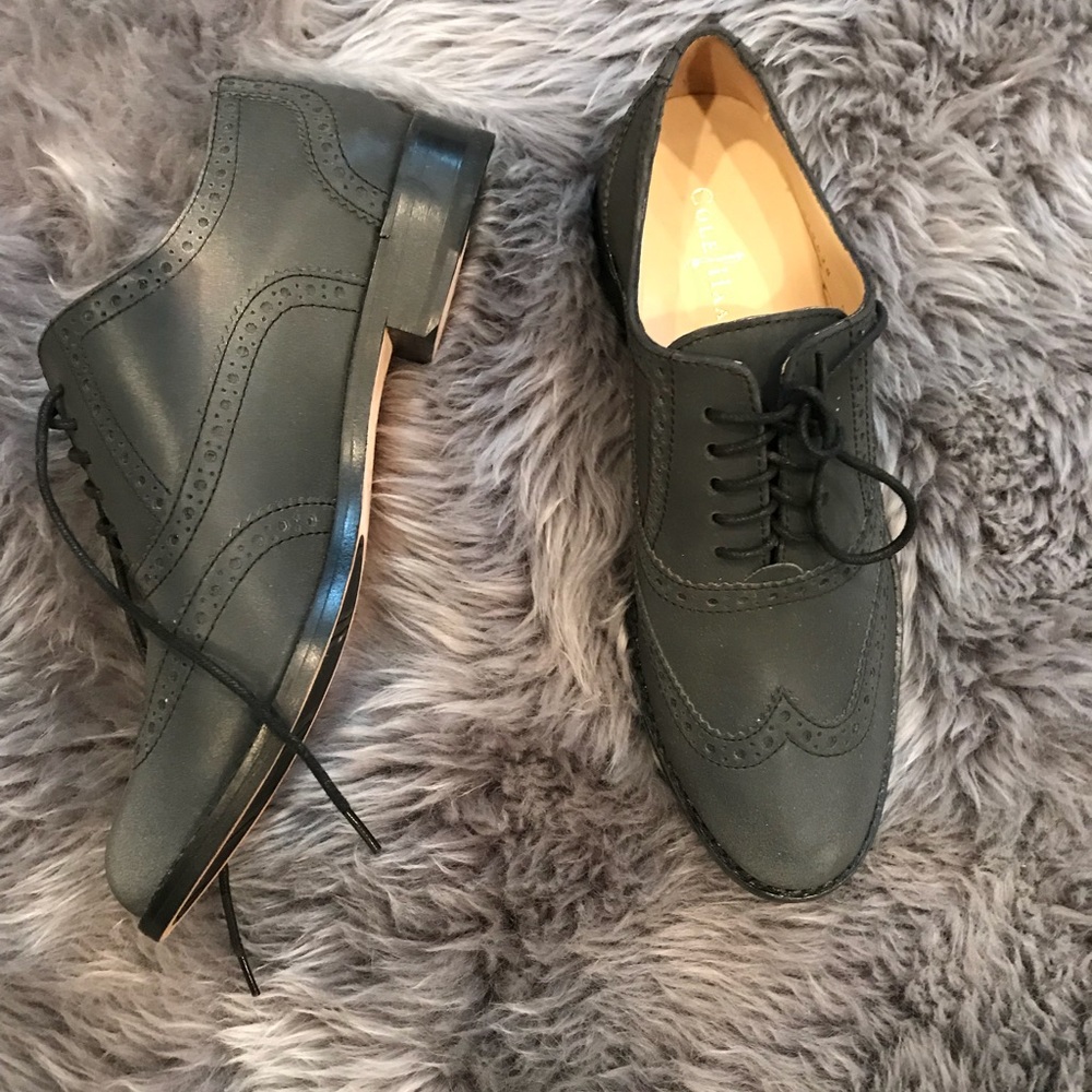 Never worn before Cole Haan wing tip shoes